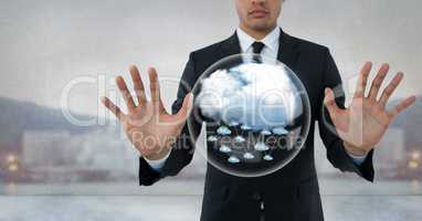 Cloud bubble and Businessman touching air with open hands in front of city