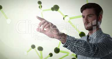 Businessman touching air in front of science micro organisms
