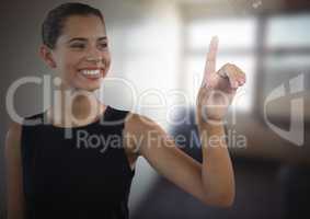 Businesswoman touching air in front of office