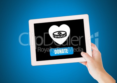 Hand holding tablet with donate button and heart and money icon for charity