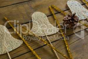 High angle view of glittering sticks and bell shape decoration
