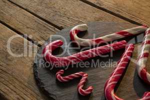 High angle view of candy canes on wood