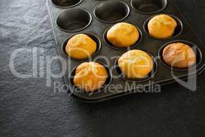 Plain cupcakes in baking tray