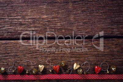 Christmas decorations on wooden plank