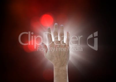 Hand touching the air with glow