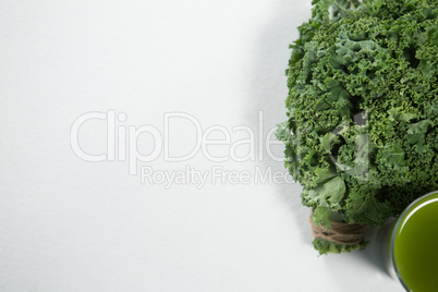 Directly above view of fresh kale with juice