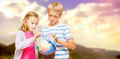 Composite image of friends looking at globe