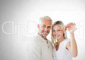 Couple holding key in front of Vignette