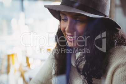 Close-up of woman in cafe