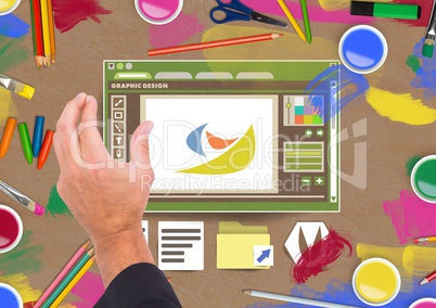 Hand touching Graphic design editor window and creative art objects on Paper cut out desktop