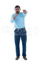 Male executive shouting against white background