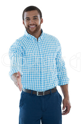 Male executive offering handshake against white background Male executive offering handshake against white background