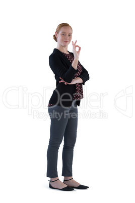 Woman showing hand OK sign