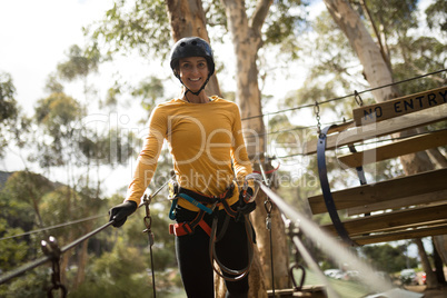 Woman on zipline in adventure park