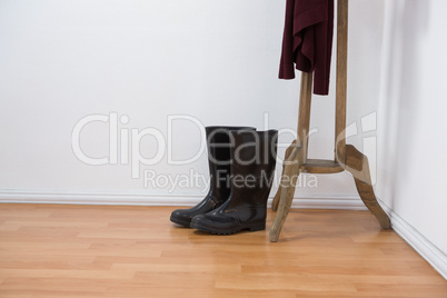 Wellington boots on wooden floor