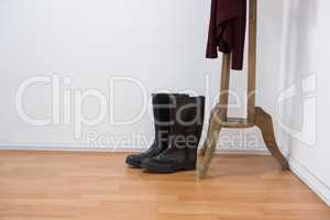 Wellington boots on wooden floor