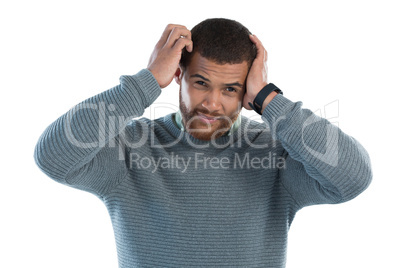 Confused man against white background