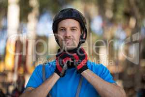 Man wearing helmet in park