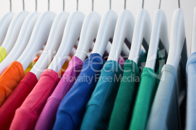 Colorful t-shirts arranged in a row