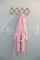 Bathrobe hanging on hook