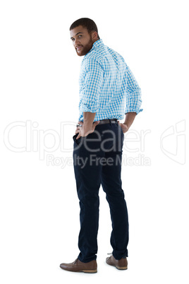 Male executive posing against white background