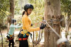 Woman on zipline in adventure park