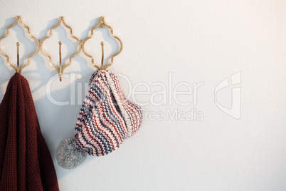 Close-up of warm clothes hanging on hook