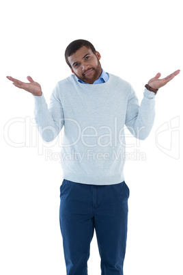 Male executive gesturing against white background