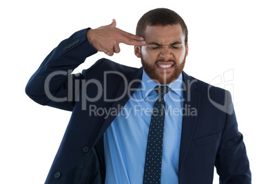 Businessman making gun gesture