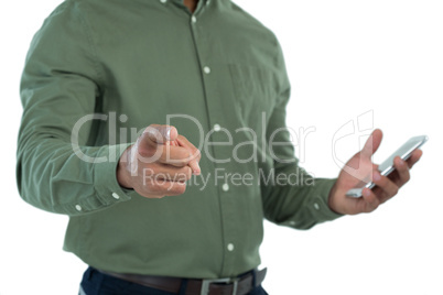 Male executive pretending to use an invisible screen