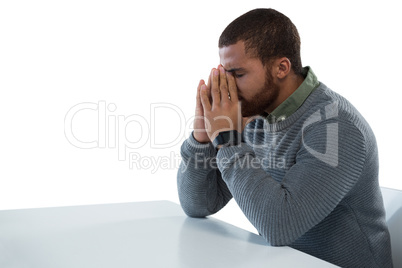 Upset man against white background