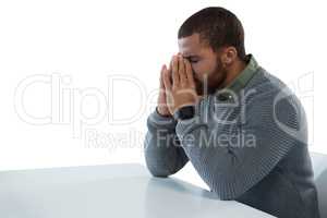 Upset man against white background