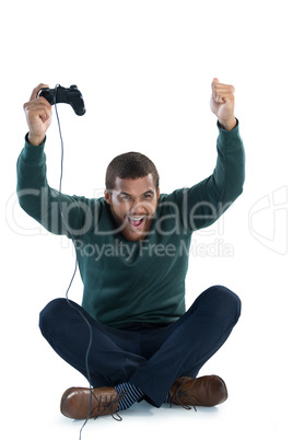 Excited man playing video games