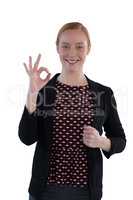 Woman showing hand OK sign