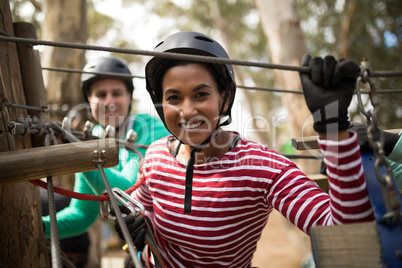 Woman on zipline in adventure park