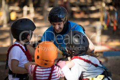 Instructor and kids having fun in park