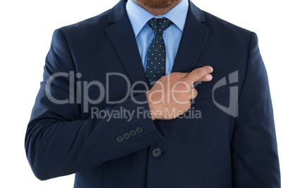 Businessman holding his finger crossed