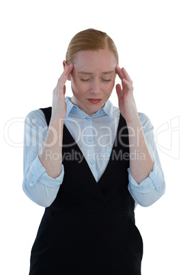 Female executive suffering from headache