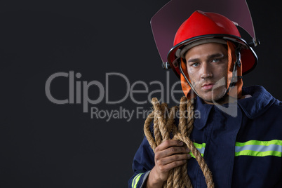 Fireman standing with a rope