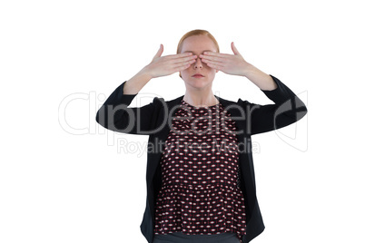 Woman covering both her eyes