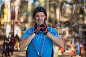 Man wearing helmet in park