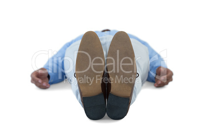 Male executive sleeping on white background