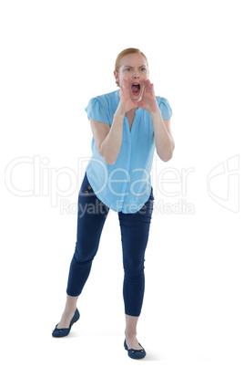 Female executive shouting against white background