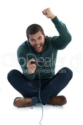 Excited man playing video games