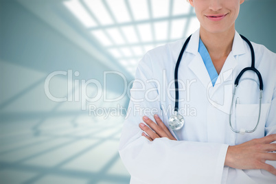 Composite image of blonde doctor smiling at camera