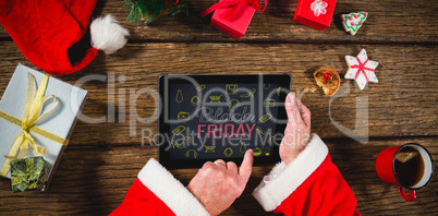 Composite image of black friday with icons on blackboard