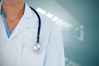 Composite image of doctor wearing lab coat with stethoscope