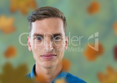 Man's face in forest with leaves