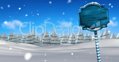 Wooden signpost in Christmas Winter landscape