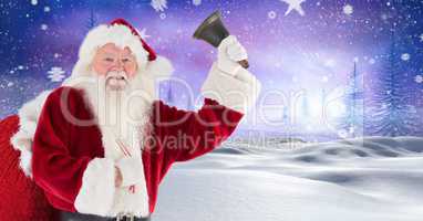 Santa with a  bell in Christmas Winter landscape